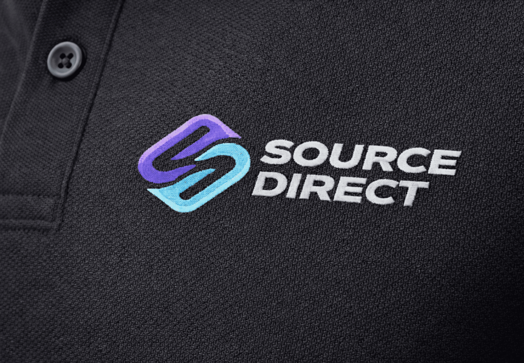 Custom embroidered logo on black polo shirt showing high-quality stitching detail