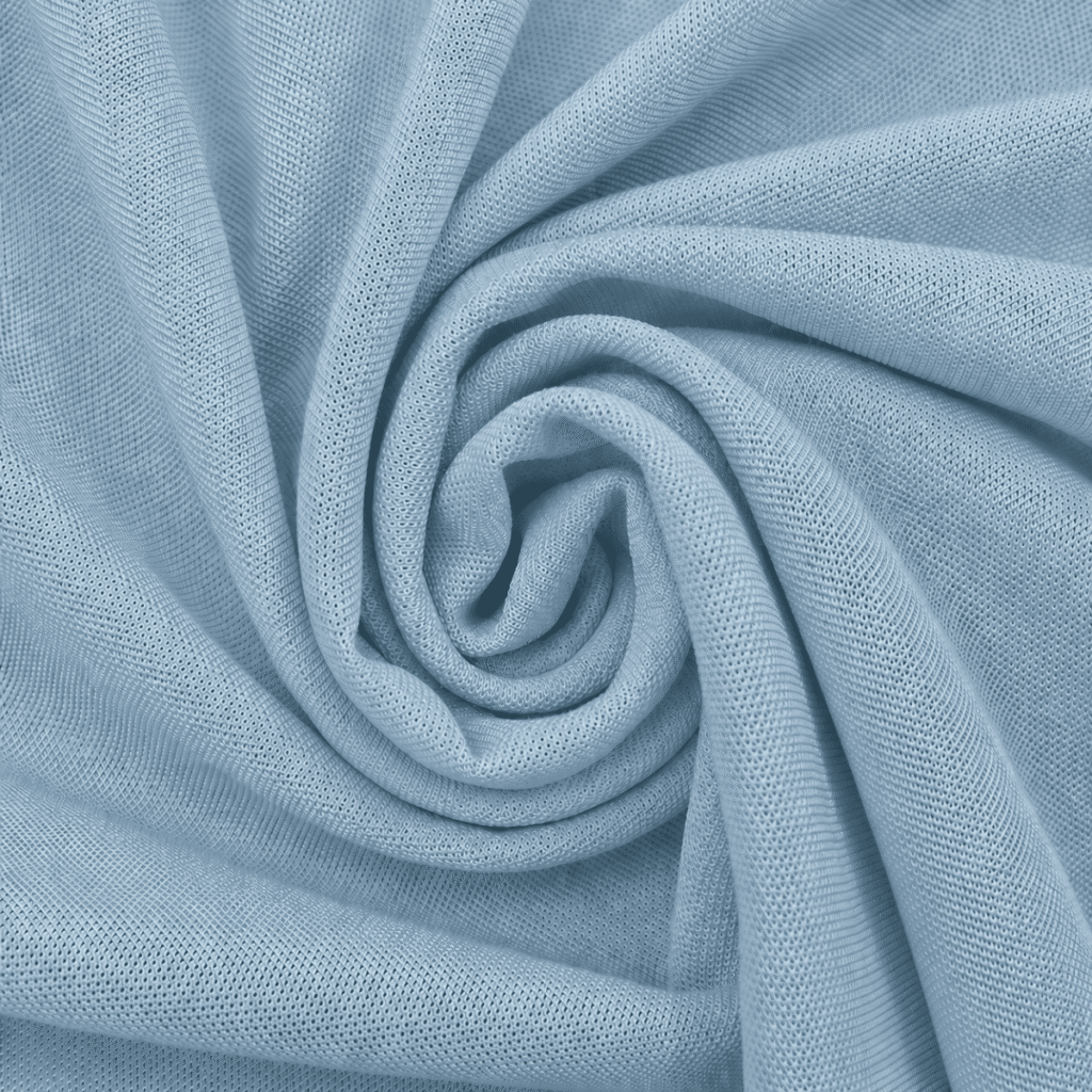 Close-up of Blue grey pique knit polo fabric showing texture, weave detail and premium finish.