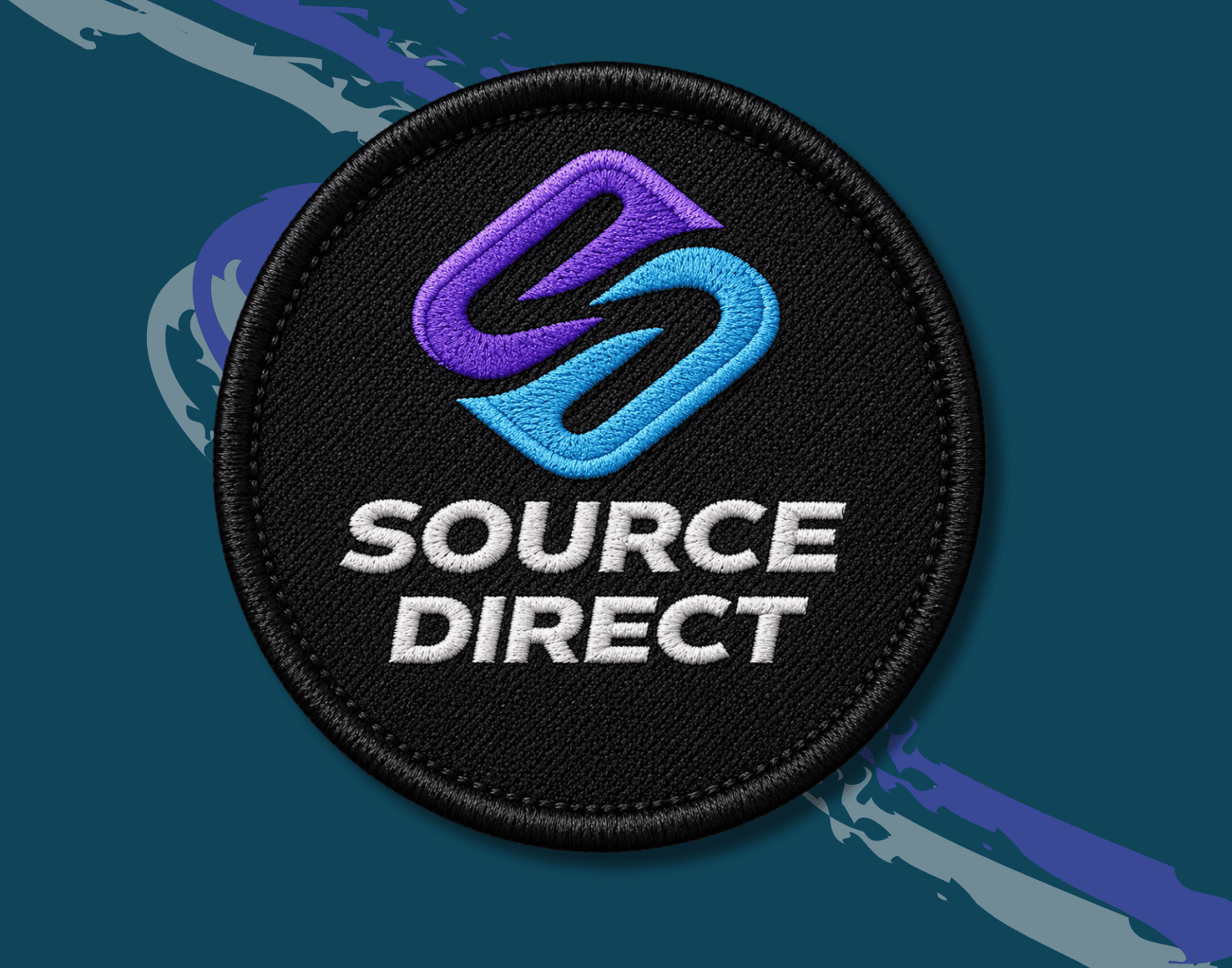 Embroidered Source Direct patch symbolising direct access to premium apparel manufacturing in Vietnam.